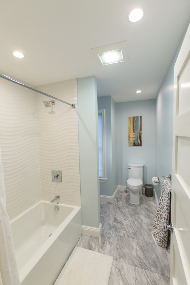Inspiration for a mid-sized transitional master blue tile and subway tile bathroom remodel in Boston with flat-panel cabinets, white cabinets, blue walls, an undermount sink, quartz countertops and a hinged shower door