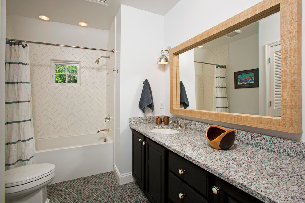 Example of a mid-sized classic kids' gray tile and subway tile mosaic tile floor bathroom design in DC Metro with an undermount sink, flat-panel cabinets, black cabinets, granite countertops, a one-piece toilet and white walls