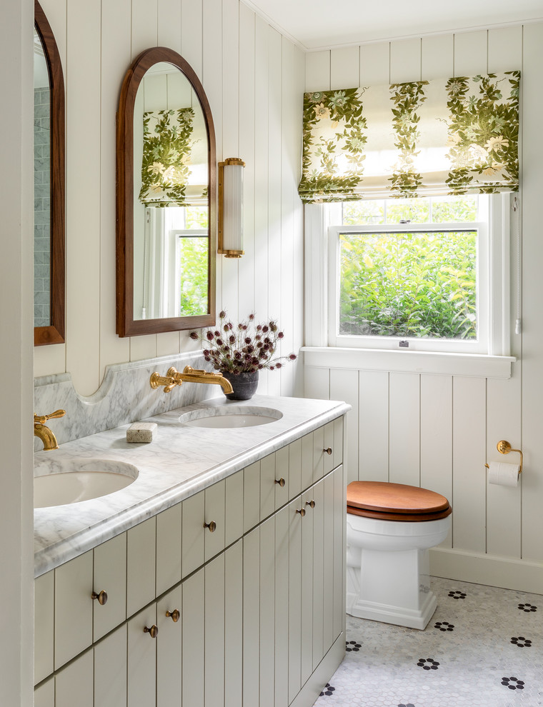 Inspiration for a timeless mosaic tile floor bathroom remodel in Seattle with flat-panel cabinets, gray cabinets, white walls, an undermount sink and white countertops