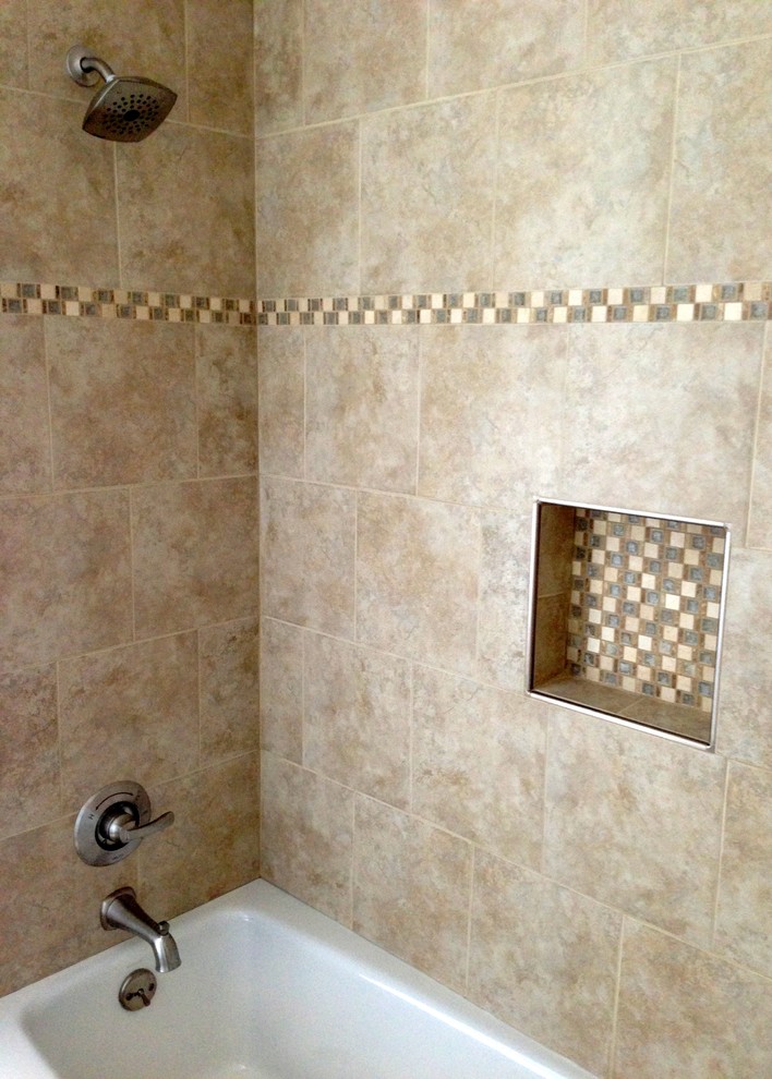 Mid-sized transitional beige tile and glass tile ceramic tile bathroom photo in San Francisco with an undermount sink, raised-panel cabinets, white cabinets, quartz countertops, a two-piece toilet and blue walls