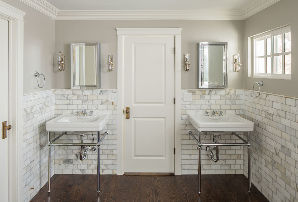 Example of a classic white tile and stone tile bathroom design in Salt Lake City with a console sink