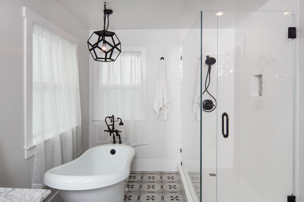 Example of a mid-sized country master black and white tile and ceramic tile porcelain tile and multicolored floor bathroom design in San Francisco with furniture-like cabinets, light wood cabinets, an integrated sink, marble countertops and multicolored walls