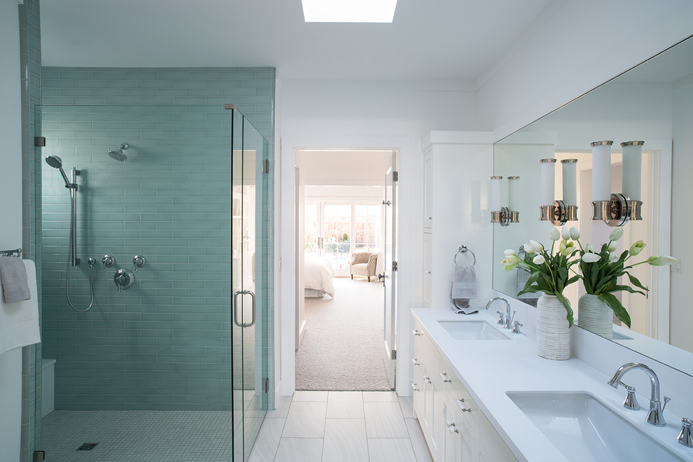 Design ideas for a medium sized rural ensuite bathroom in San Francisco with shaker cabinets, white cabinets, a built-in shower, green tiles, glass tiles, white walls, porcelain flooring, a submerged sink and quartz worktops.
