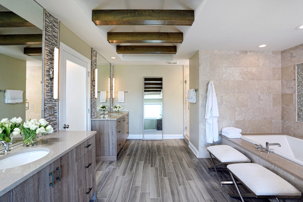 Inspiration for a large rustic master brown tile and porcelain tile porcelain tile and brown floor bathroom remodel in Chicago with flat-panel cabinets, medium tone wood cabinets, beige walls, an undermount sink, quartz countertops and a hinged shower door