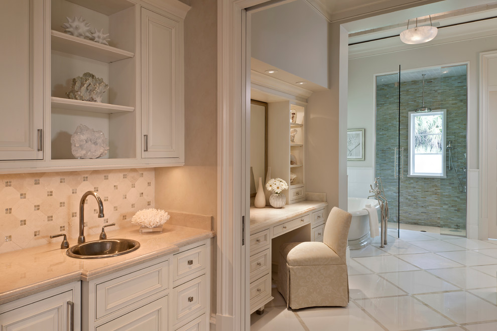 Photo of an expansive coastal ensuite bathroom in Boston with a built-in sink, recessed-panel cabinets, white cabinets, a freestanding bath, an alcove shower, green tiles, matchstick tiles and beige walls.