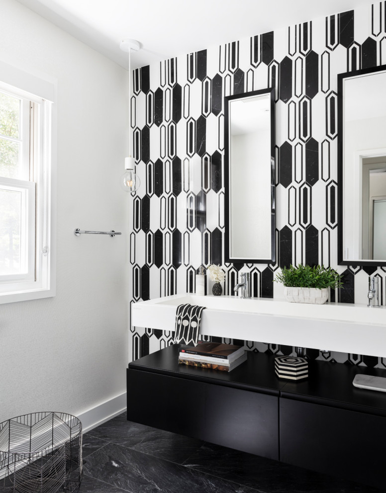 Example of a mid-sized trendy master black and white tile and ceramic tile black floor and ceramic tile bathroom design in New York with flat-panel cabinets, black cabinets, multicolored walls, a trough sink, quartz countertops and white countertops