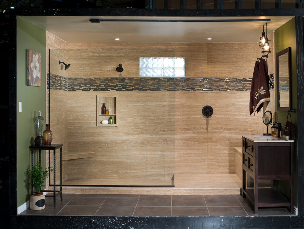 Example of a large minimalist master stone slab slate floor doorless shower design in Detroit with raised-panel cabinets, dark wood cabinets and beige walls