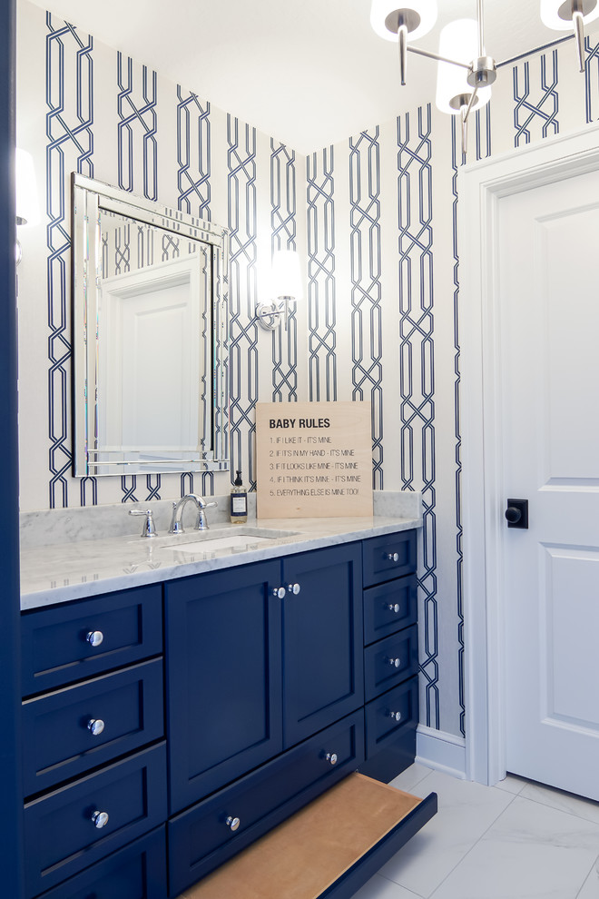 Inspiration for a mid-sized farmhouse kids' gray floor bathroom remodel in Cleveland with blue cabinets and blue walls