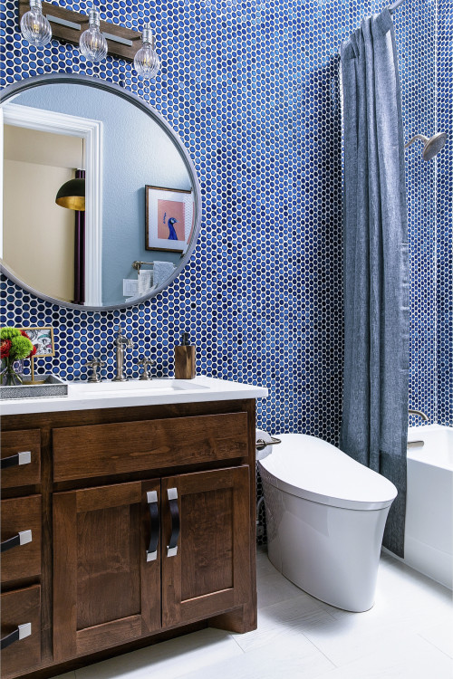 Navy Elegance: Dark Wood Washstand with Navy Blue Penny Tile in Blue Bathroom Ideas