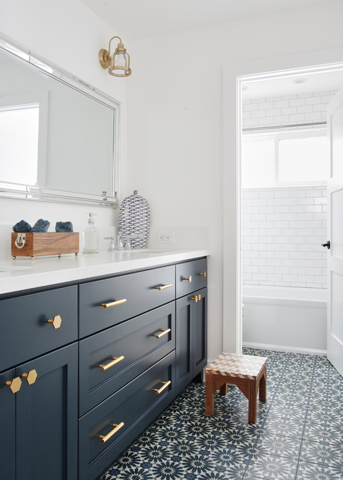 Floral Fantasy: Coastal Blue and White Bathroom with Flower Patterned Floor