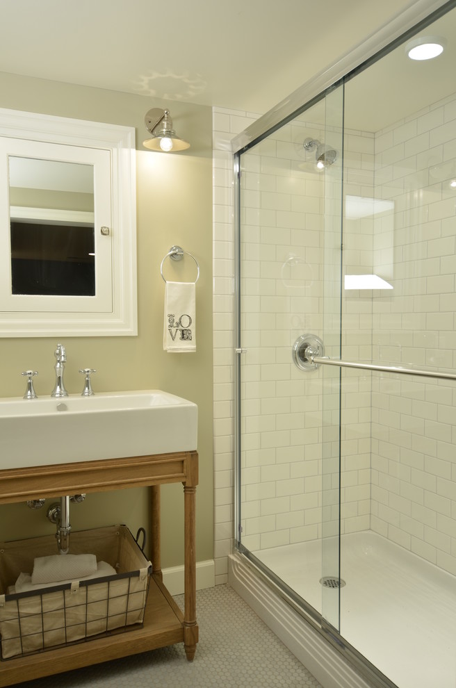 Mid-sized elegant white tile and subway tile ceramic tile alcove shower photo in Portland with furniture-like cabinets, light wood cabinets, beige walls and a console sink