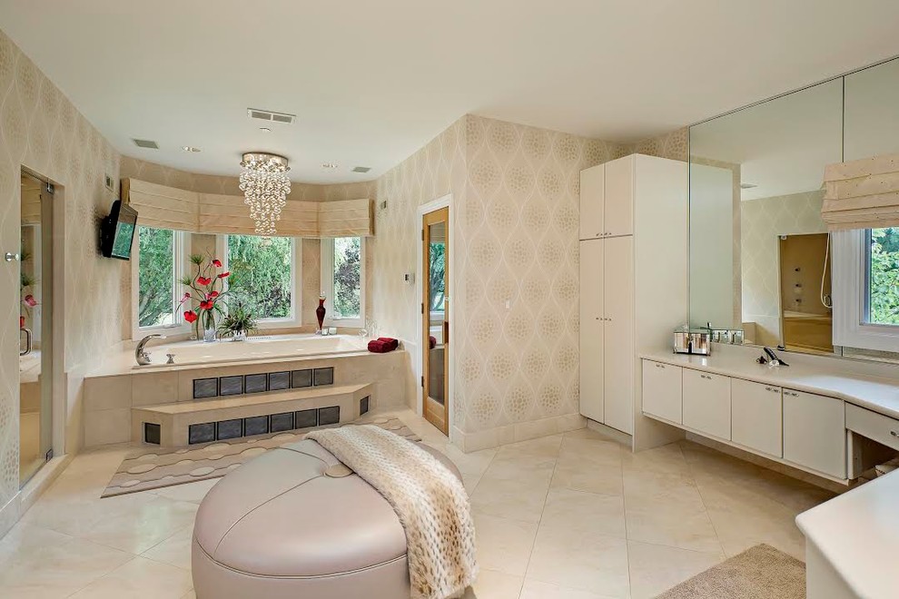 Inspiration for an expansive contemporary ensuite bathroom in Chicago with flat-panel cabinets, white cabinets, a built-in bath, an alcove shower, a one-piece toilet, beige walls, ceramic flooring, a submerged sink, solid surface worktops, beige floors and a hinged door.
