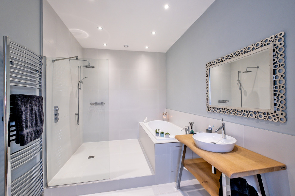 Modern ensuite bathroom in Other with a built-in bath.