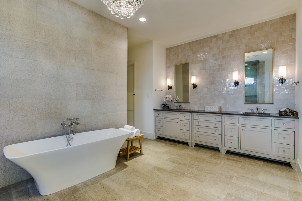 Inspiration pour une salle de bain principale traditionnelle de taille moyenne avec un placard à porte shaker, des portes de placard blanches, une baignoire indépendante, une douche double, un carrelage beige, des carreaux en terre cuite, un lavabo encastré et un mur blanc.