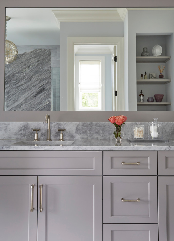 Inspiration for a large classic ensuite bathroom in Chicago with shaker cabinets, grey cabinets, a freestanding bath, an alcove shower, a two-piece toilet, grey tiles, blue walls, porcelain flooring, a submerged sink, grey floors, an open shower and grey worktops.
