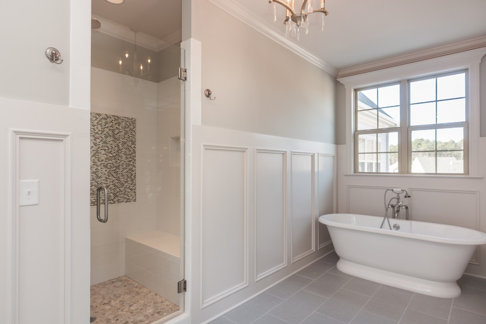 Bathroom - small transitional master gray tile and ceramic tile porcelain tile bathroom idea in Raleigh with gray walls