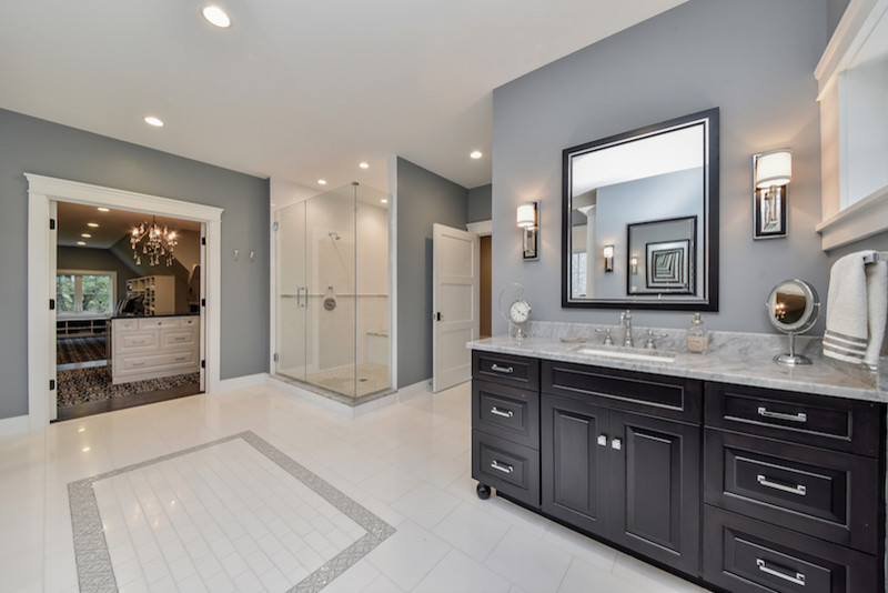 Example of a huge arts and crafts master white tile and subway tile marble floor double shower design in Chicago with dark wood cabinets, a hot tub, gray walls, an undermount sink and marble countertops