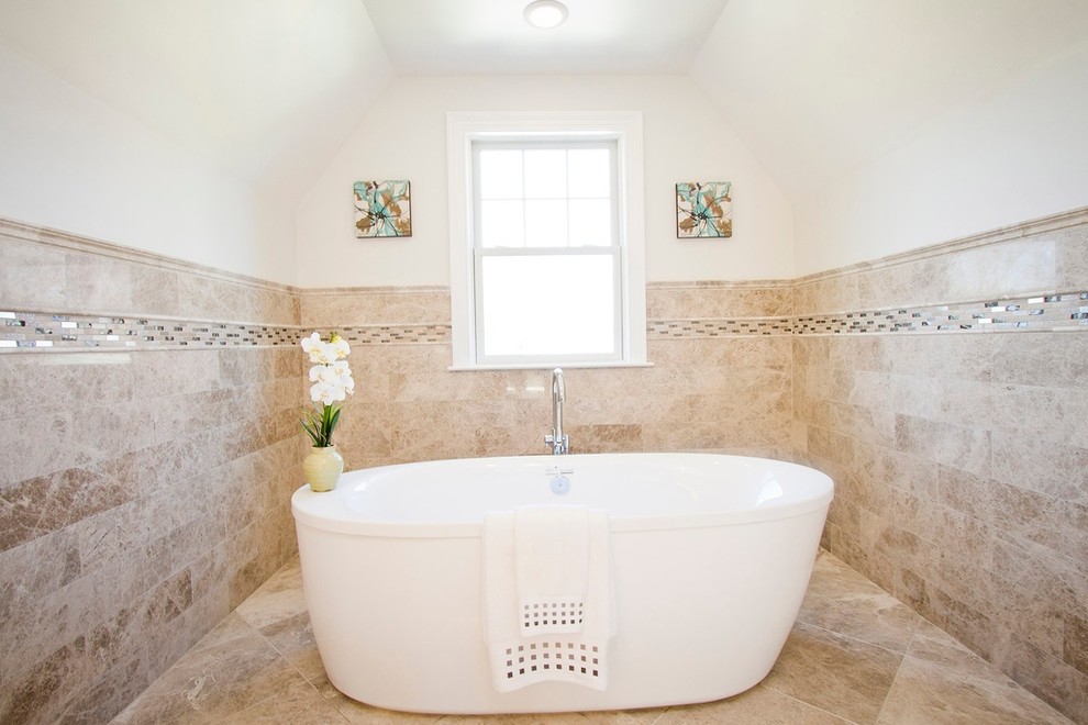 Design ideas for a medium sized traditional ensuite bathroom in DC Metro with a vessel sink, shaker cabinets, white cabinets, granite worktops, a freestanding bath, a corner shower, a two-piece toilet, beige tiles, stone tiles, grey walls and marble flooring.