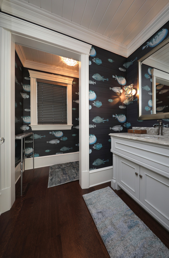 Inspiration for a large nautical shower room bathroom in Other with a submerged sink, white cabinets, multi-coloured walls, dark hardwood flooring and brown floors.