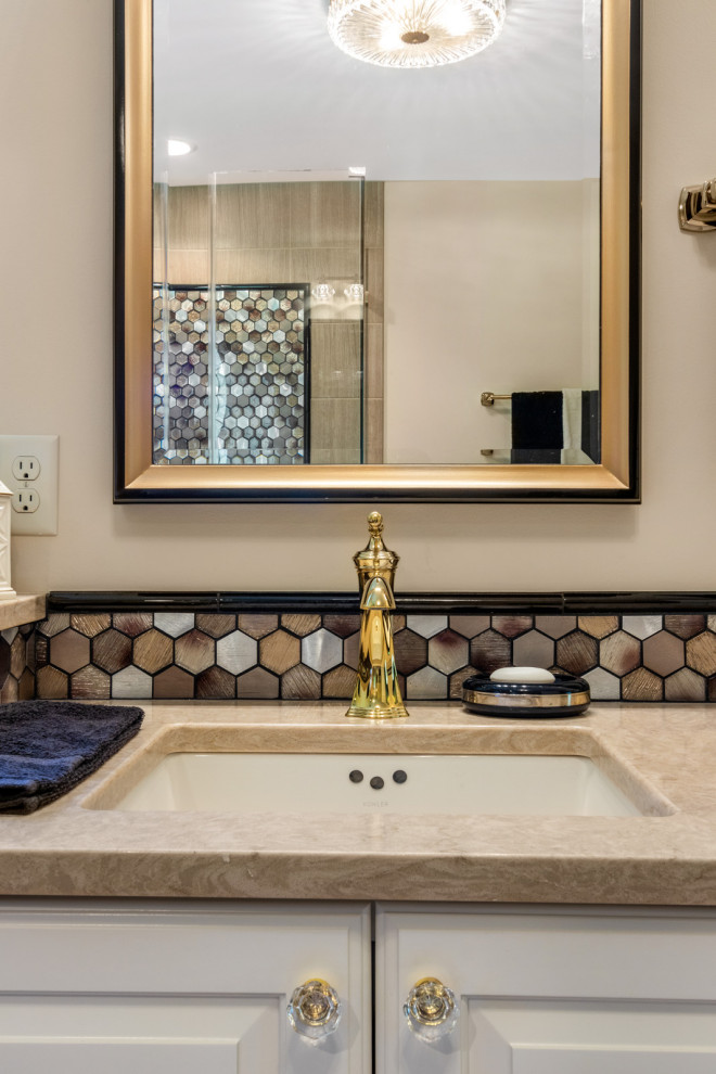 Large elegant master multicolored tile and glass tile dark wood floor and brown floor bathroom photo in Milwaukee with brown walls, raised-panel cabinets, white cabinets, a two-piece toilet, an undermount sink, quartz countertops, a hinged shower door and beige countertops