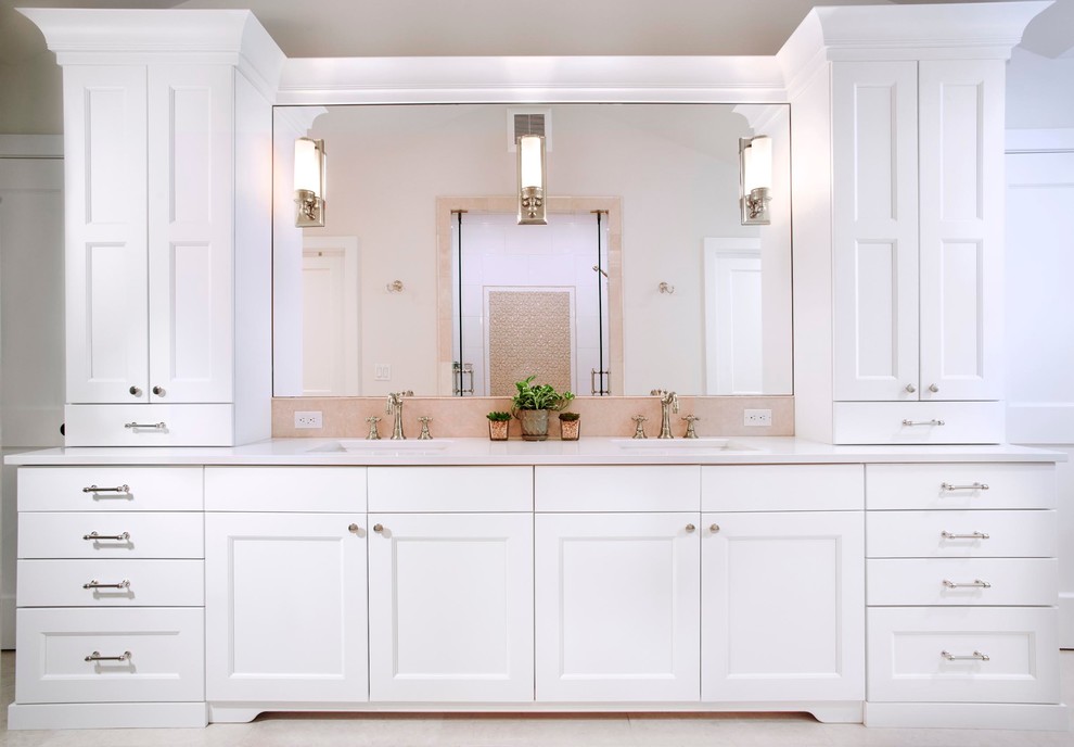 Inspiration for a mid-sized timeless master beige tile and stone slab porcelain tile and beige floor alcove shower remodel in Denver with shaker cabinets, white cabinets, beige walls, an undermount sink, quartzite countertops and a hinged shower door