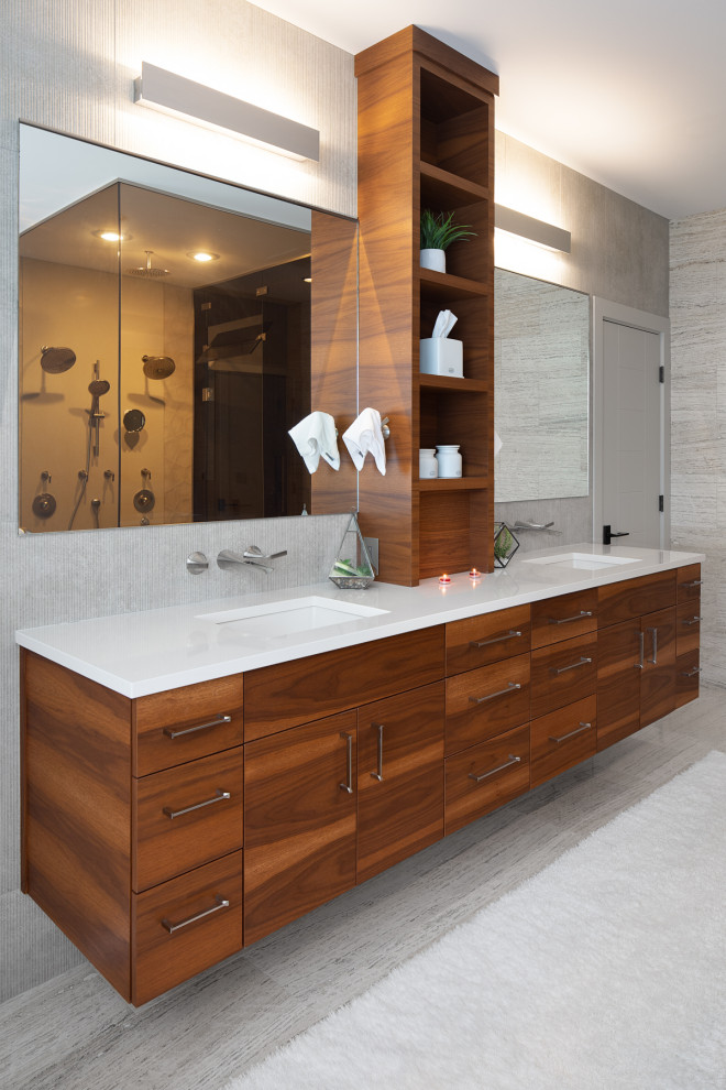 Bathroom - large modern master white tile and porcelain tile porcelain tile and gray floor bathroom idea in Other with flat-panel cabinets, medium tone wood cabinets, a one-piece toilet, gray walls, a wall-mount sink, quartzite countertops, a hinged shower door and white countertops