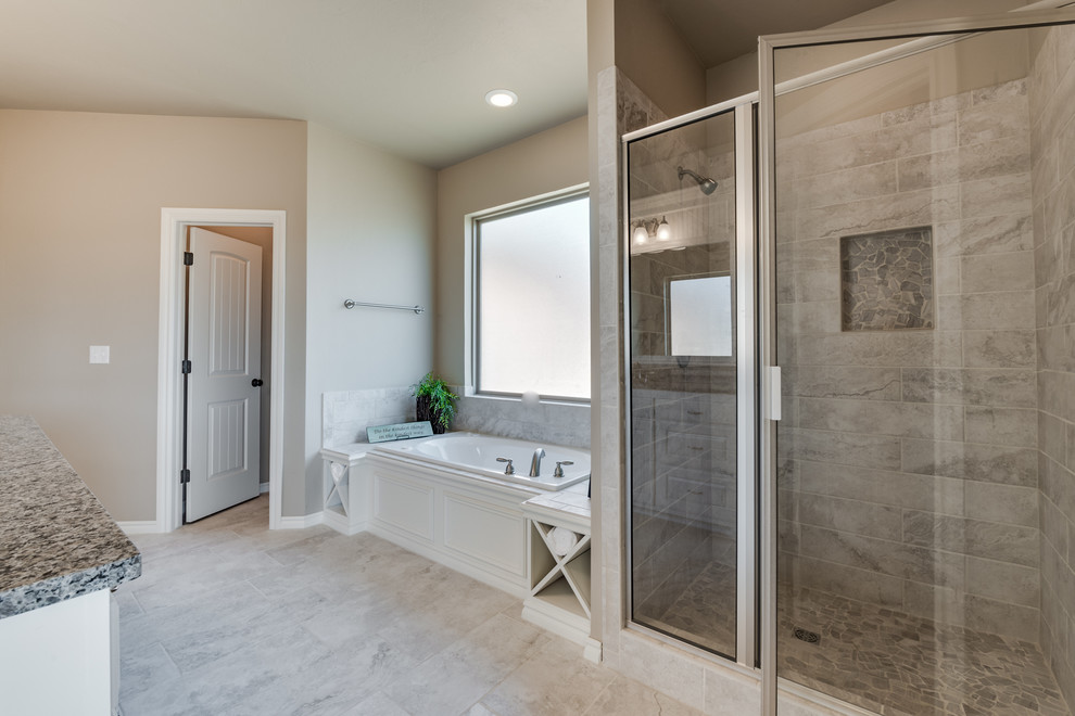 Bathroom - large transitional master gray tile and porcelain tile porcelain tile bathroom idea in Oklahoma City with shaker cabinets, white cabinets, beige walls, an undermount sink and granite countertops