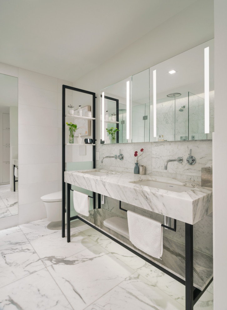 На фото: ванная комната в современном стиле с белой плиткой, врезной раковиной, белым полом, белой столешницей и тумбой под две раковины