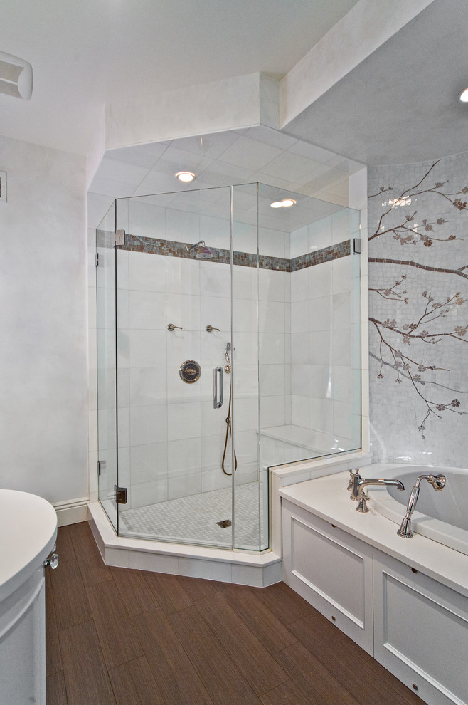 This is an example of a large contemporary ensuite bathroom in New York with a built-in bath, a corner shower, white tiles, glass tiles, white walls and porcelain flooring.