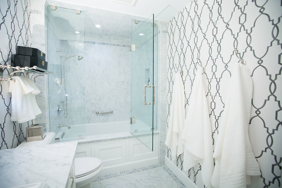 Example of a mid-sized classic master white tile and ceramic tile marble floor freestanding bathtub design in Orange County with beaded inset cabinets, white cabinets, granite countertops, a two-piece toilet and beige walls