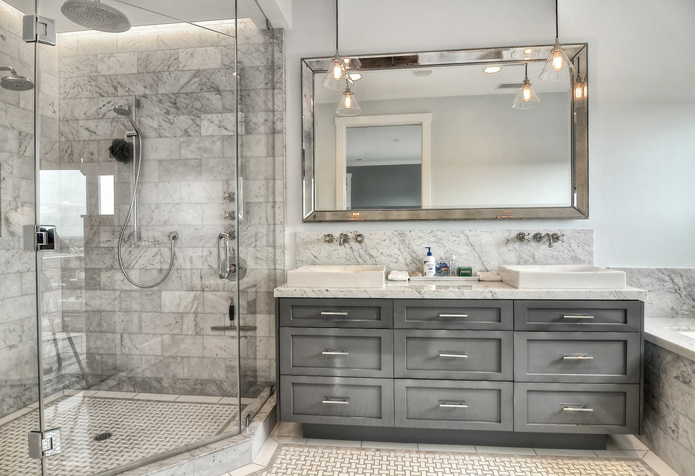 Large minimalist master white tile and marble tile mosaic tile floor and beige floor corner shower photo in Orange County with shaker cabinets, gray cabinets, an undermount tub, gray walls, a vessel sink, marble countertops and a hinged shower door