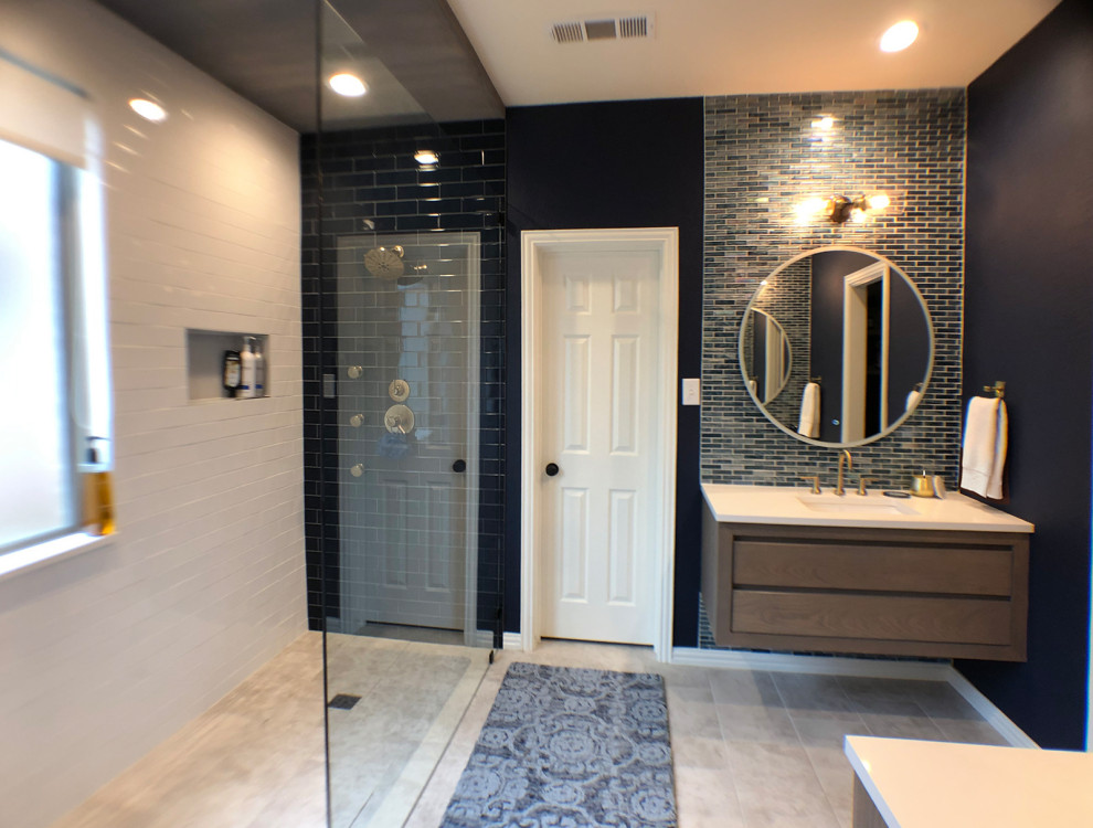 Inspiration for a medium sized contemporary ensuite bathroom in Dallas with distressed cabinets, a built-in shower, blue tiles, glass tiles, blue walls, porcelain flooring, grey floors, an open shower and white worktops.