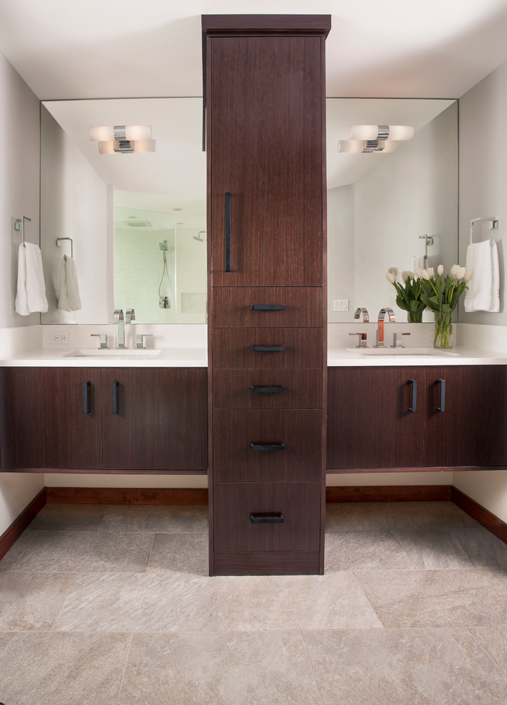 Photo of a medium sized contemporary ensuite bathroom in Seattle with flat-panel cabinets, dark wood cabinets, a two-piece toilet, white tiles, porcelain tiles, porcelain flooring, a submerged sink, engineered stone worktops and white walls.