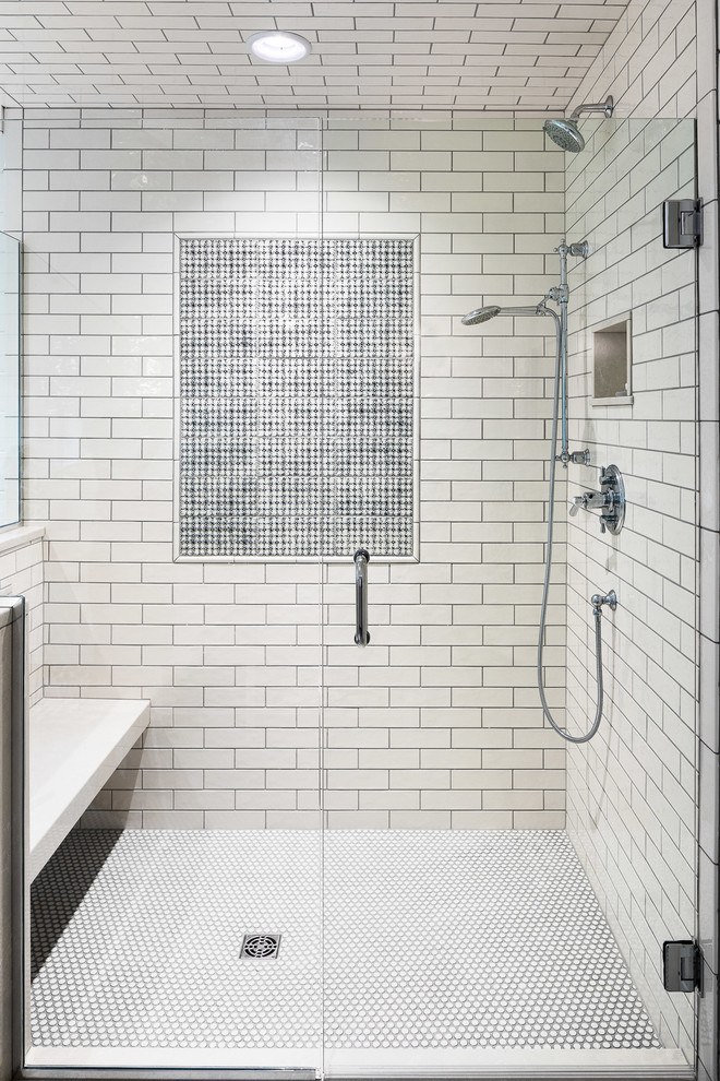 This is an example of a large vintage shower room bathroom in Burlington with a one-piece toilet, white tiles, metro tiles, white walls, mosaic tile flooring, a submerged sink, white floors and a hinged door.