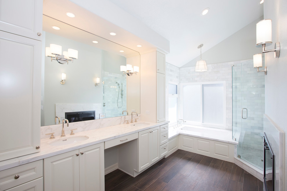 Example of a large classic master white tile and stone tile porcelain tile bathroom design in San Diego with an undermount sink, white cabinets, marble countertops, a one-piece toilet, white walls and raised-panel cabinets