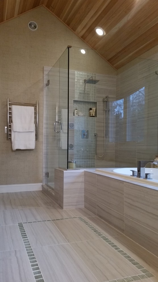 Design ideas for a large contemporary ensuite bathroom in New York with flat-panel cabinets, medium wood cabinets, quartz worktops, a built-in bath, a corner shower, beige tiles, porcelain tiles, beige walls, porcelain flooring, brown floors and a hinged door.
