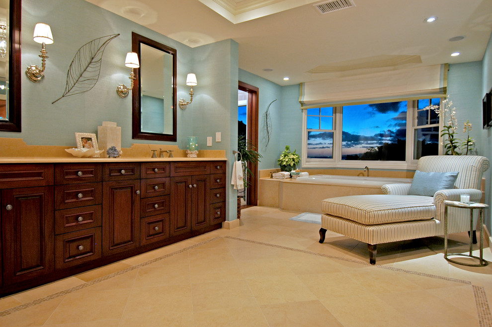 Alcove bathtub - mid-sized tropical master ceramic tile alcove bathtub idea in Hawaii with raised-panel cabinets, dark wood cabinets, blue walls and an undermount sink