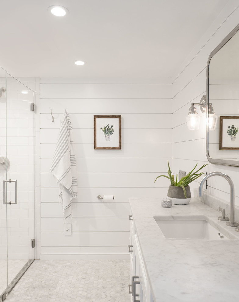 Bathroom - mid-sized farmhouse master bathroom idea in Other with shaker cabinets, a wall-mount toilet and a hinged shower door