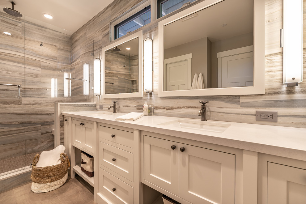 Design ideas for a traditional bathroom in San Francisco with recessed-panel cabinets, white cabinets, a corner shower, beige tiles, beige walls, a submerged sink, brown floors, a hinged door and white worktops.
