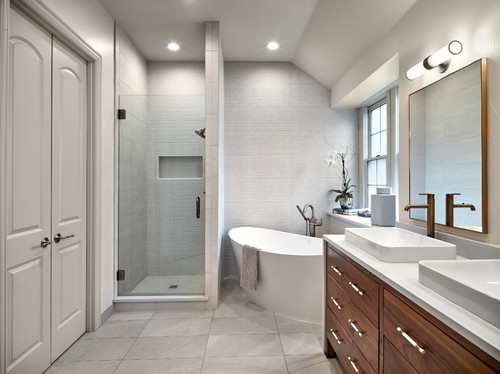 Stunning contemporary black, white and gold bathroom boasts white