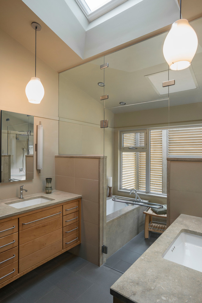 Example of a mid-sized asian master beige tile walk-in shower design in Other with an undermount sink, an undermount tub, beige walls, flat-panel cabinets and medium tone wood cabinets