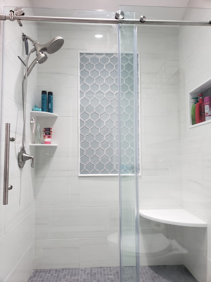 Bathroom - mid-sized modern master white tile and porcelain tile porcelain tile and double-sink bathroom idea in New York with shaker cabinets, white cabinets, a one-piece toilet, white walls, an undermount sink, quartzite countertops, white countertops and a built-in vanity