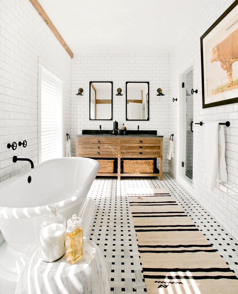 Photo of a large farmhouse ensuite wet room bathroom in New York with brown cabinets, a freestanding bath, a wall mounted toilet, white tiles, ceramic tiles, white walls, mosaic tile flooring, a built-in sink, granite worktops, white floors and flat-panel cabinets.