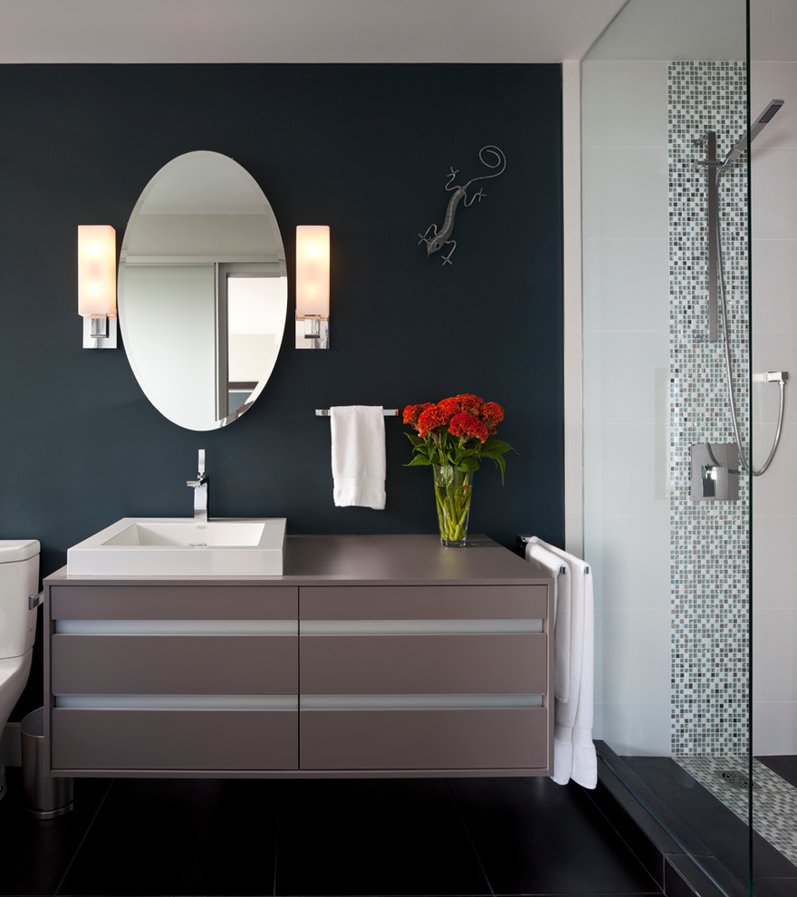 This is an example of a contemporary bathroom in Vancouver with mosaic tiles.