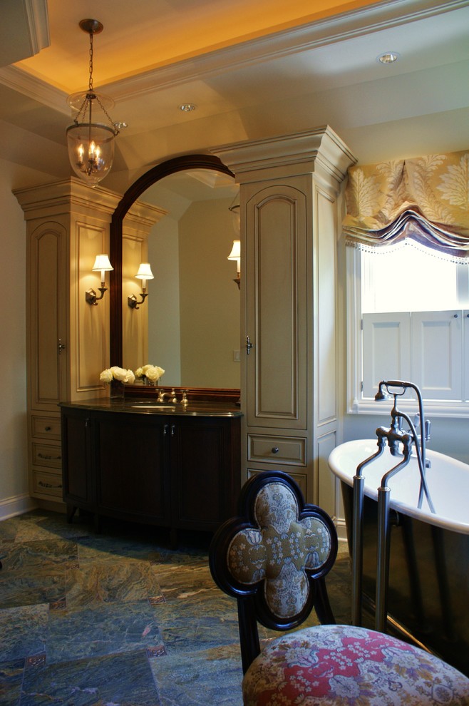 Idées déco pour une grande salle de bain principale classique en bois brun avec un placard avec porte à panneau surélevé, une baignoire indépendante, une douche double, un carrelage multicolore, un carrelage de pierre, un mur beige, un sol en marbre, un lavabo encastré et un plan de toilette en quartz.