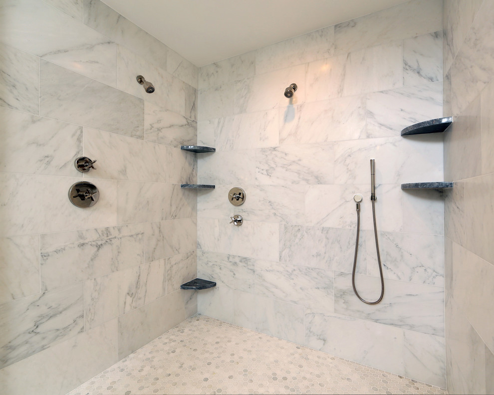 Photo of a contemporary ensuite bathroom in Boston with grey cabinets, a freestanding bath, a walk-in shower, a one-piece toilet, grey tiles, mosaic tiles, marble flooring and marble worktops.