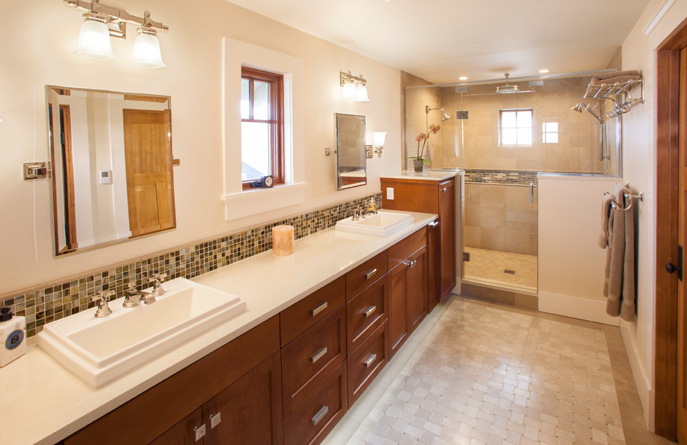 Double shower - mid-sized craftsman master beige tile and stone tile limestone floor double shower idea in Seattle with a drop-in sink, shaker cabinets, medium tone wood cabinets, quartz countertops, a two-piece toilet and beige walls