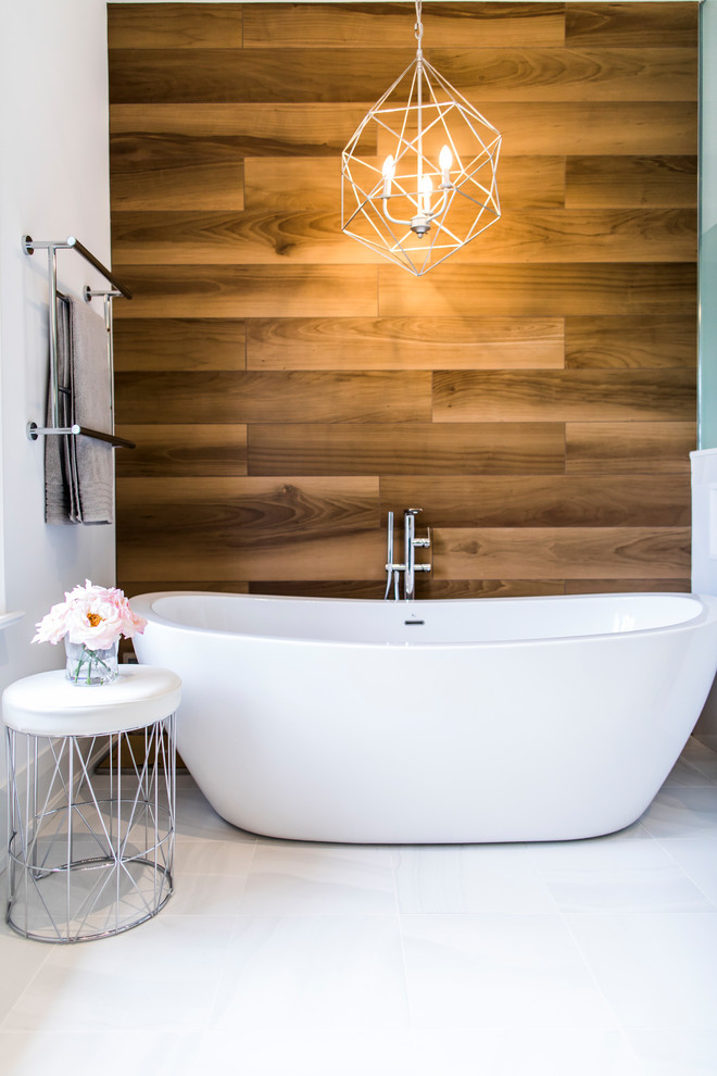 Example of a mid-sized trendy master white tile and porcelain tile porcelain tile and white floor bathroom design in Toronto with open cabinets, medium tone wood cabinets, a one-piece toilet, white walls, a drop-in sink, solid surface countertops, a hinged shower door and white countertops
