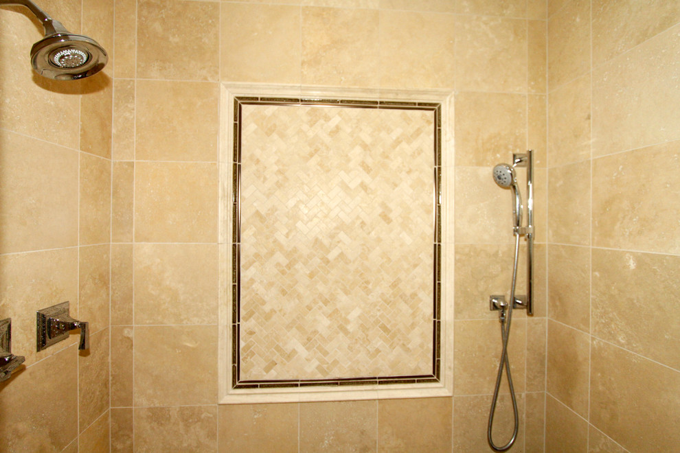 Alcove shower - large traditional master beige tile and stone tile porcelain tile alcove shower idea in Chicago with an undermount sink, raised-panel cabinets, medium tone wood cabinets, granite countertops, a two-piece toilet and beige walls
