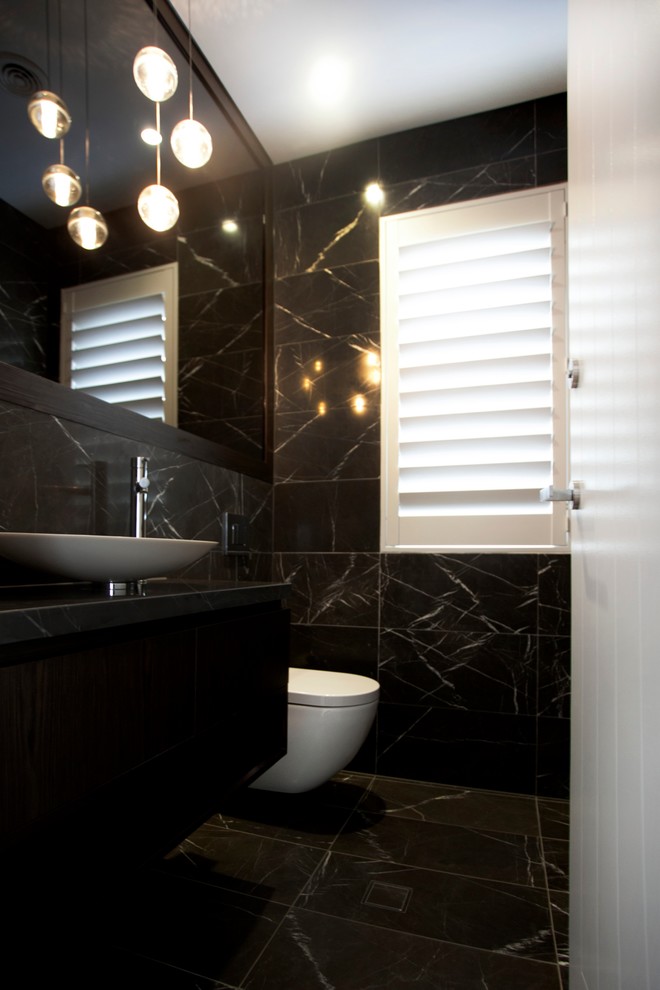 Inspiration for a modern porcelain tile bathroom remodel in Sydney